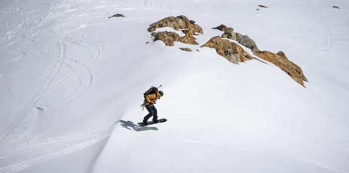 Framed Print : Splitboarder Jumps Downhill in Stubai Alps Winter Print