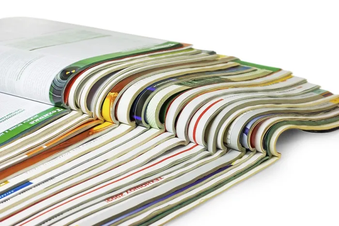 Framed Print : Stack of Magazines Print Isolated on White Background Framed Print : Stack of Magazines Print Isolated on White Background