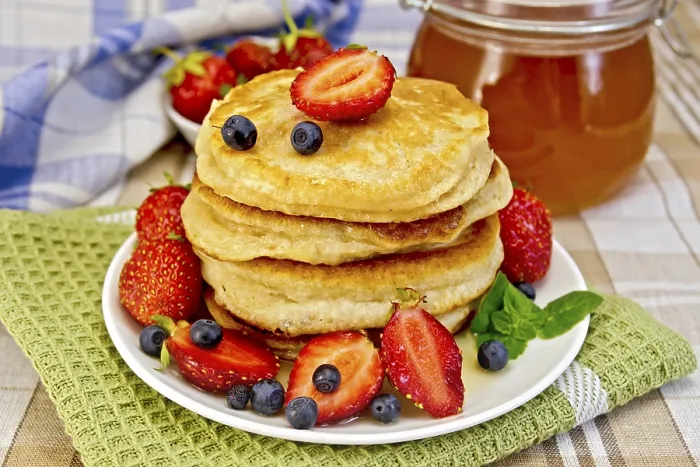 Framed Print : A Stack of Pancakes with Strawberries and Honey Print Framed Print : A Stack of Pancakes with Strawberries and Honey Print