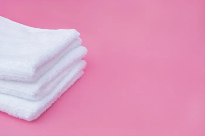 Framed Print : Stacked White Towels Pink Background Print Framed Print : Stacked White Towels Pink Background Print