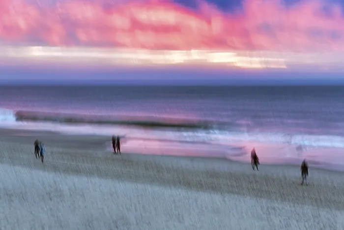 Framed Print : Strollers on the beach, dramatic sunset at the sea print Framed Print : Strollers on the beach, dramatic sunset at the sea print