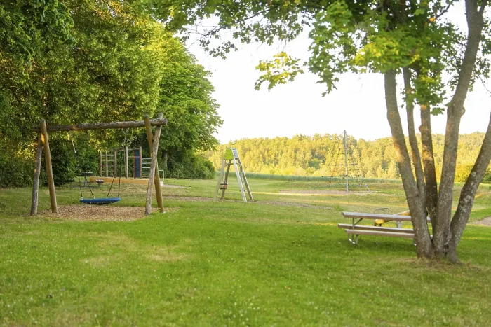 Framed Print : A swing and a table in a green clearing with fields, Print Framed Print : A swing and a table in a green clearing with fields, Print