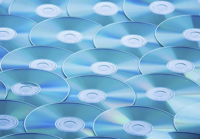 Framed Print : A Table Full of CD-ROMs and DVDs Print Framed Print : A Table Full of CD-ROMs and DVDs Print