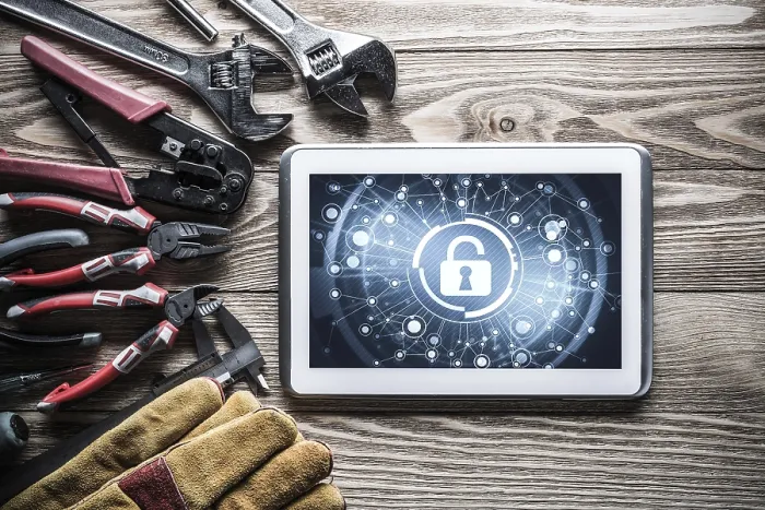 Framed Print : Tablet PC with Security Concept and Industrial Tools - Print Framed Print : Tablet PC with Security Concept and Industrial Tools - Print