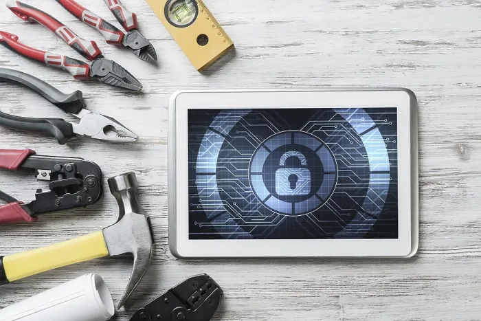 Framed Print : Tablet PC with Security Concept and Industrial Tools - Print Framed Print : Tablet PC with Security Concept and Industrial Tools - Print