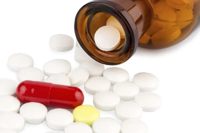 Framed Print : Medication Overload Print - Tablets in a Glass Container Framed Print : Medication Overload Print - Tablets in a Glass Container