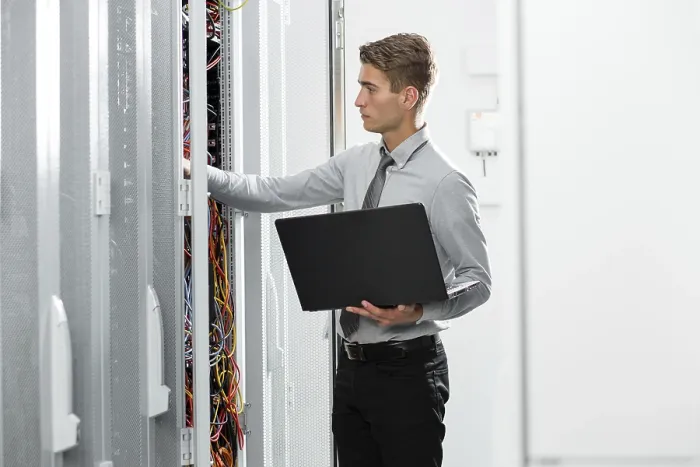 Framed Print : Technicians analyzing server in server room Print Framed Print : Technicians analyzing server in server room Print