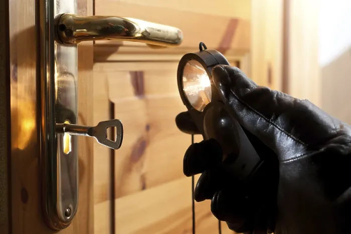 Framed Print : Thief Examining Door Lock Print Framed Print : Thief Examining Door Lock Print
