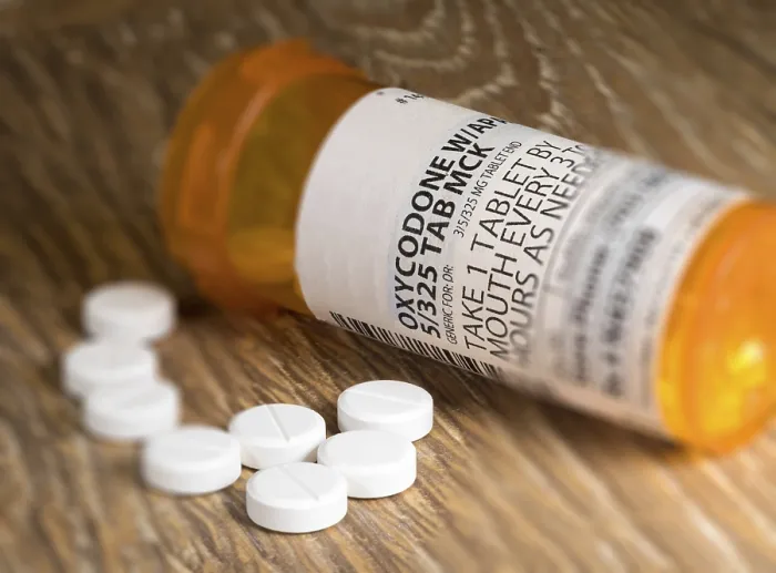 Framed Print : Tiltshift Print of Oxycodone Prescription Bottle on Wooden Table Framed Print : Tiltshift Print of Oxycodone Prescription Bottle on Wooden Table