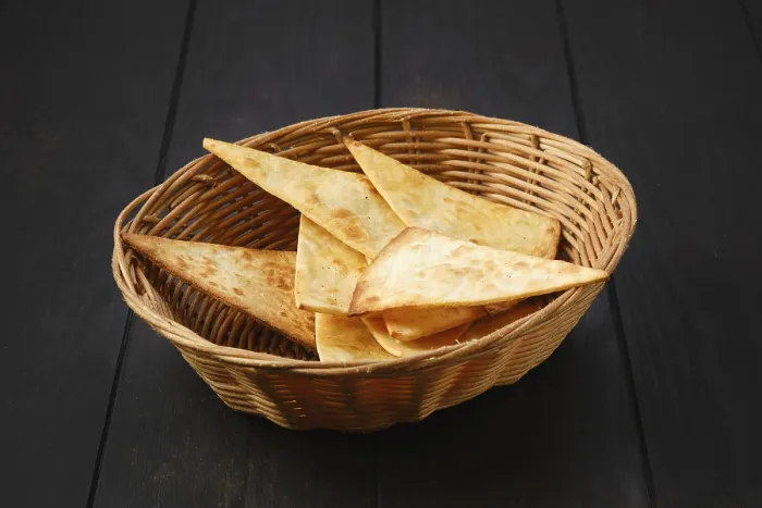 Framed Print : Tortilla Cut on Triangular Slices in Wicker Basket Print Framed Print : Tortilla Cut on Triangular Slices in Wicker Basket Print