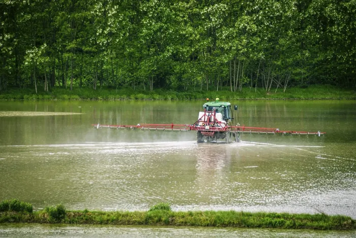 Framed Print : Tractor working in flooded rice fields Print, Novara, Italy Framed Print : Tractor working in flooded rice fields Print, Novara, Italy