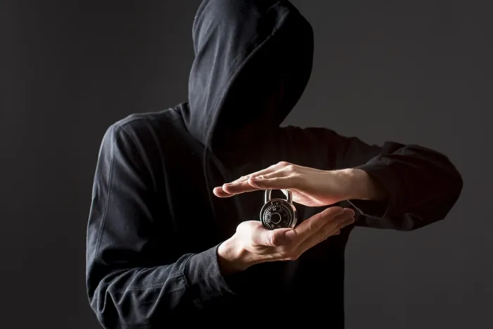 Framed Print : Front View Hacker Holding Lock Print Framed Print : Front View Hacker Holding Lock Print