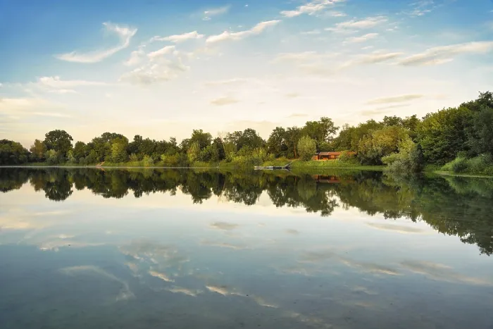 Framed Print : View of a lake in the evening, Print with Reflection and Hut Framed Print : View of a lake in the evening, Print with Reflection and Hut