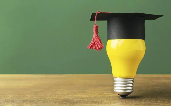 Framed Print : Front View Lightbulb with Academic Cap Print Framed Print : Front View Lightbulb with Academic Cap Print