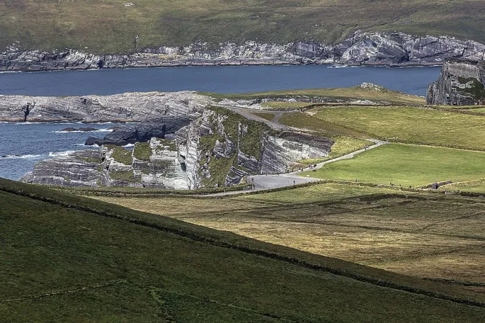 Framed Print : View of meadows and cliffs from Coomanaspig Pass Print, Ireland