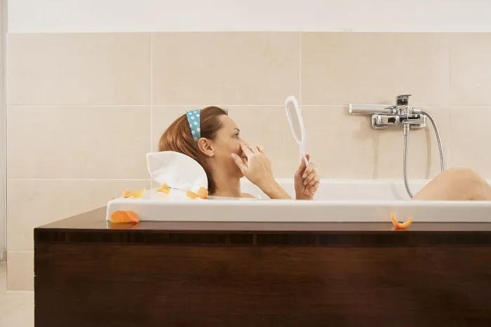 Framed Print : Woman Checking Expression Lines While Bathing Print Framed Print : Woman Checking Expression Lines While Bathing Print