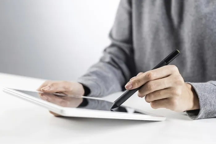 Framed Print : Woman using Tablet Computer for Project Management Print