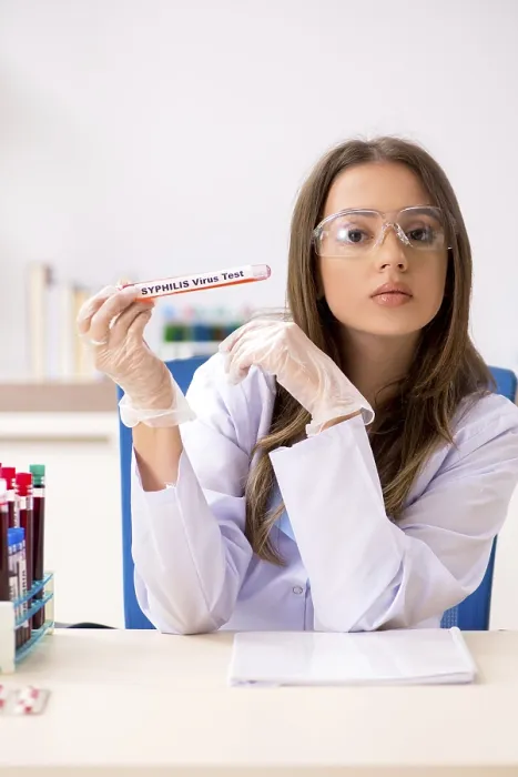 Framed Print : Young Lab Assistant Testing Blood Samples Print