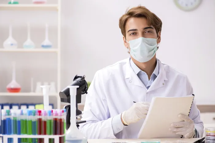 Framed Print : Young Chemist Working in the Lab Print