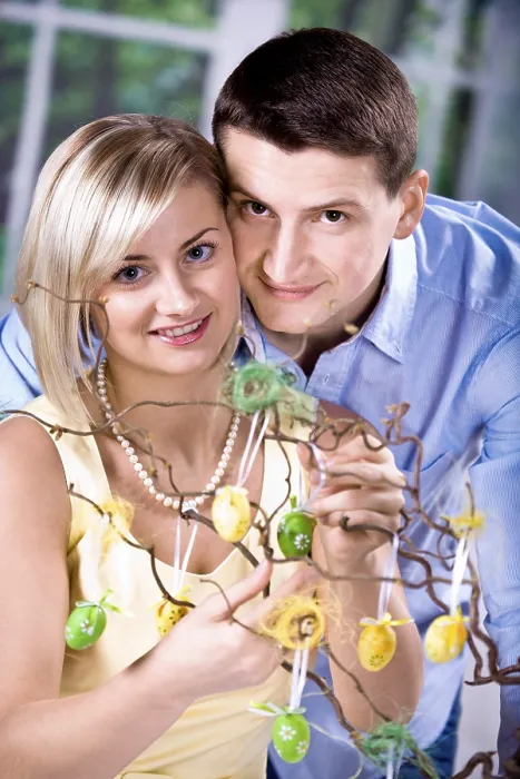 Framed Print : Young Couple Decorating for Easter Print