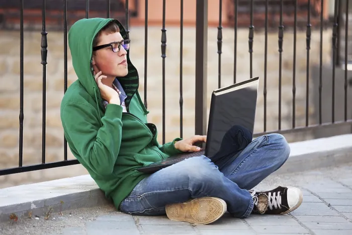 Framed Print : Young Student Using Laptop Print Framed Print : Young Student Using Laptop Print