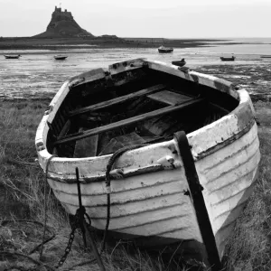 Lindisfarne Castle Print: Decaying Fishing Boat with Castle