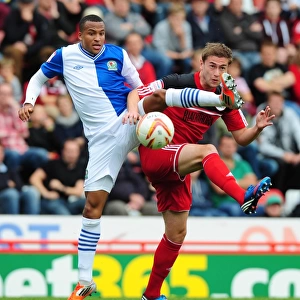 Battling for Supremacy: Davies vs. Olsson in the Championship Clash between Bristol City and Blackburn Rovers
