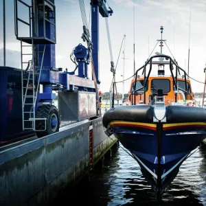 Launch of the first Shannon class lifeboat built at the All-Weather Lifeboat Centre (ALC) in Poole. The ceremonial bell was rung 8 times as the lifeboat Cosandra 13-12 was lowered into the water