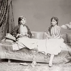 1880s - young Egyptian women being served coffee