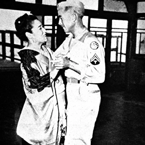 American Soldier dancing with a Japanese Geisha, 1945