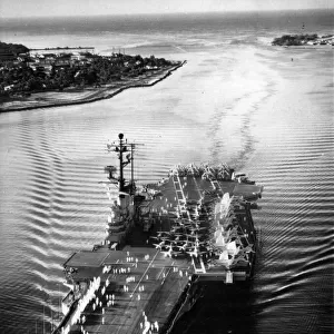 The attack carrier USS Coral Sea enters Pearl Harbour