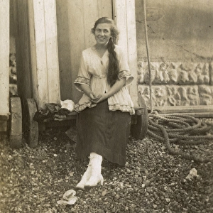 Bessie Benson photographed in front of her Bathing Machine