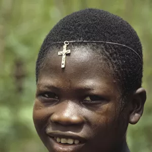 Boy with crucifix on his forehead, Sierra Leone
