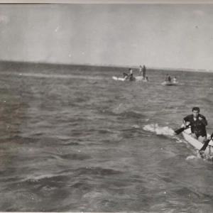 Boy scouts in boating relay race, British Honduras