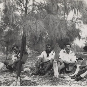 Boy scouts relaxing under a tree, Mauritius