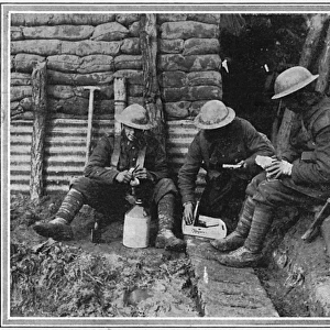 Canadian soldiers eating lunch in a trench