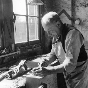 Craftsman at a cabinet makers, Shoreditch, London