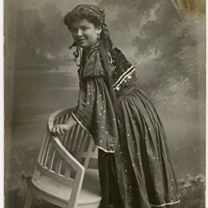 Czech Peasant girl in traditional costume - studio portrait