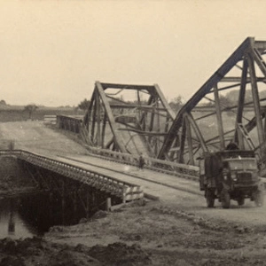 Damaged bridge on a river crossing