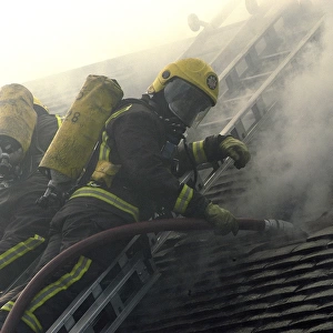 Firefighters respond to a house fire, North London