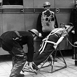 Firefighters in training with resuscitation stretcher