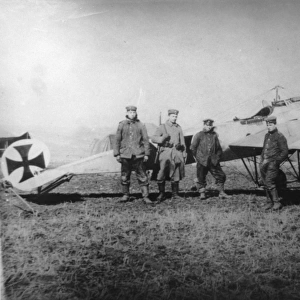 Fokker EII of Lt Parschau (far right), aft, (on the gro