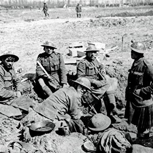 Gordon Highlanders resting in shell hole, WW1