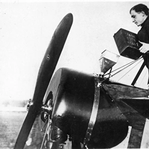 Gustav W Hamel refuelling his aircraft