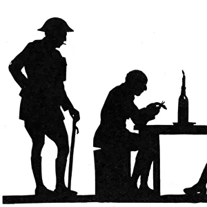 H. L. Oakley cutting the silhouette of a fellow officer