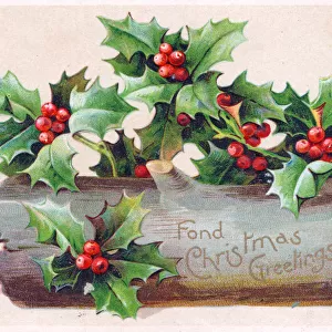 Holly and log on a Christmas postcard