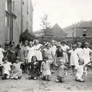 Infant Primary School, England - Schoolgirls in the garden