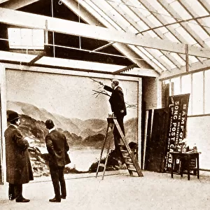 James Bamforth painting a backdrop at Bamforth's