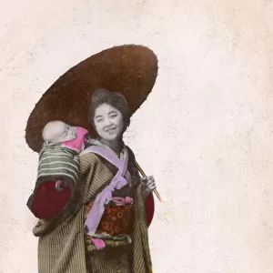Japan - Young Japanese Mother carrying her baby