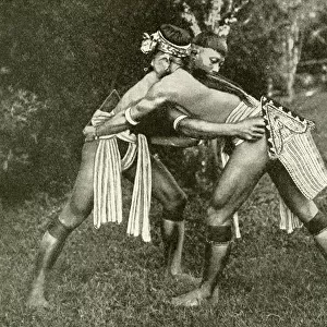 Two Kayan wrestlers of Borneo, SE Asia